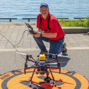 The Owner, Jeremy Cartlidge posing witha. DJI Matrice 210 drone